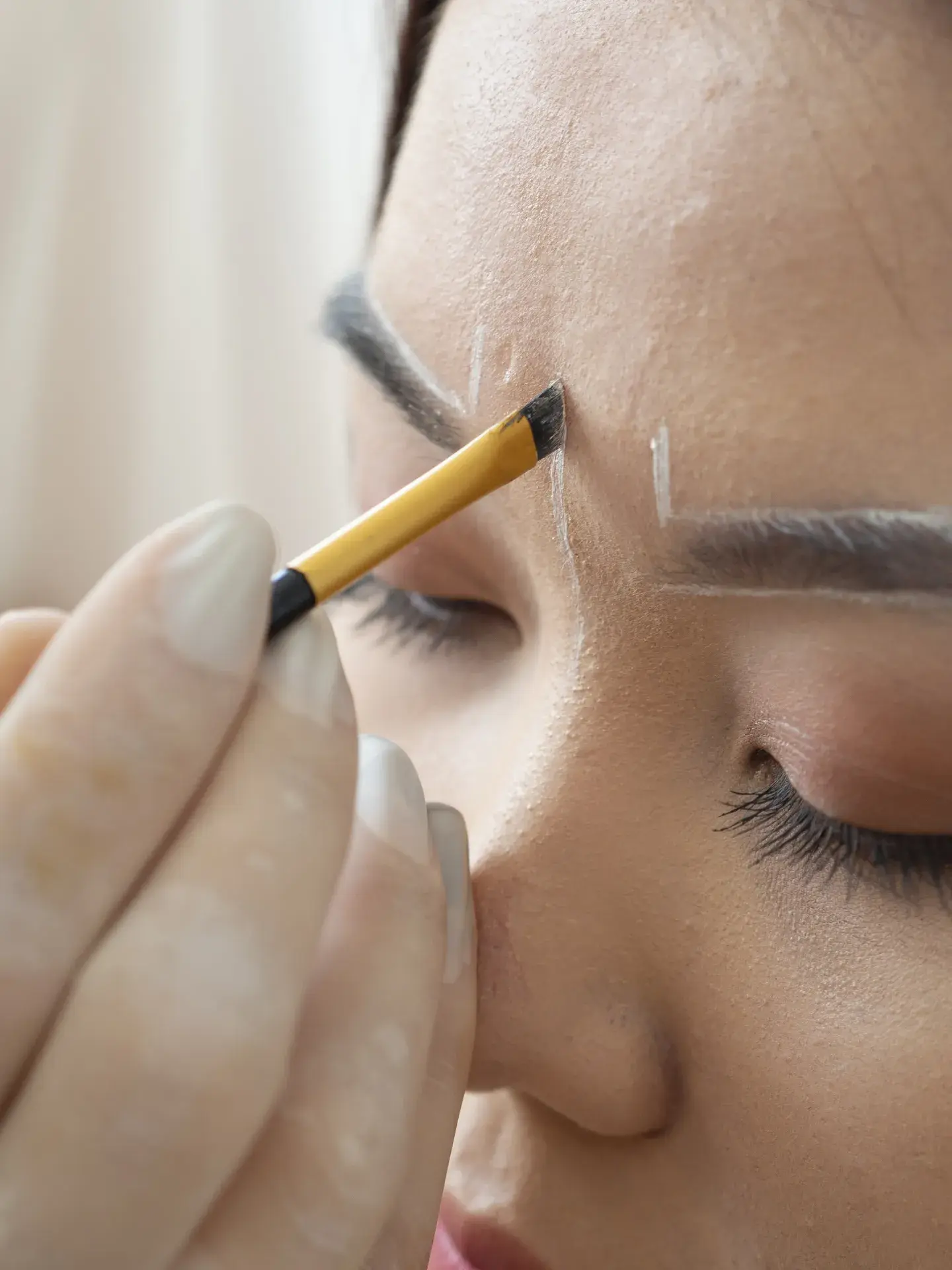 Client Going Through Microblading Treatment